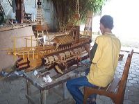 miniature-ship-hand_1f86285